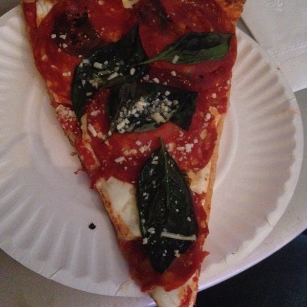 Photo taken at South Brooklyn Pizza by Joshua D. on 5/22/2014