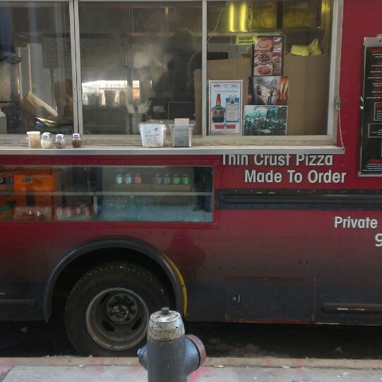 Photo taken at The Eddie&#39;s Pizza Truck by Meredith F. on 12/16/2013