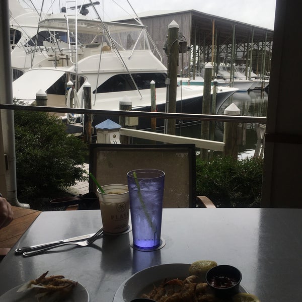 Photo taken at Fisher&#39;s at Orange Beach Marina by Shelly M. on 8/20/2020