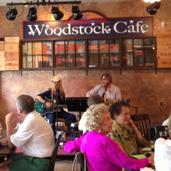 Photo taken at Woodstock Cafe &amp; Shoppes by Leland B. on 8/11/2013