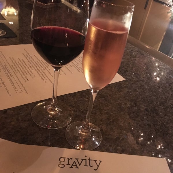 Photo taken at Gravity Bistro &amp; Wine Bar by Irina S. on 12/9/2016