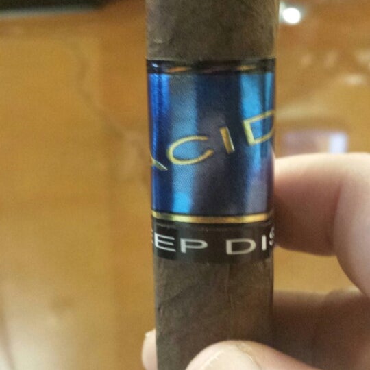 Photo taken at Silo Cigars Inc. by Erritt D. on 12/22/2013