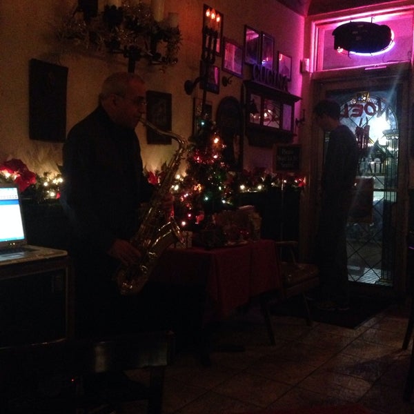 Photo taken at George&#39;s Cucina Italina by Candice J. on 12/6/2014