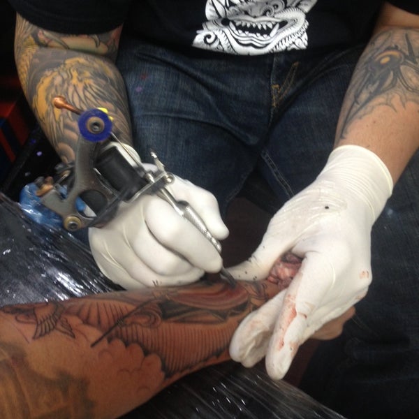 Photo taken at Inkstop Tattoo by Mark R. on 10/16/2013