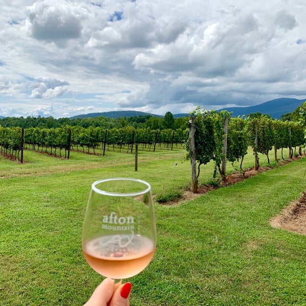 Photo taken at Afton Mountain Vineyards by Amanda I. on 8/25/2019