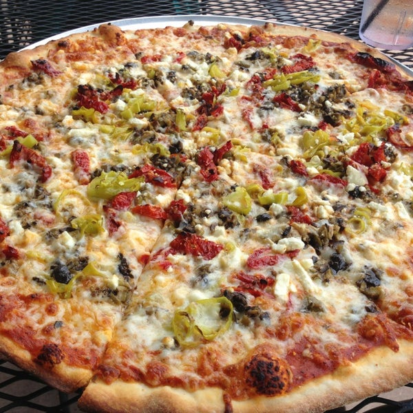 Photo taken at Greenville Avenue Pizza Company by j w. on 3/30/2013