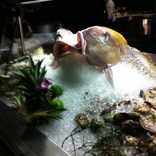 Photo taken at Deep Blu Seafood Grille by Krista B. on 2/10/2013
