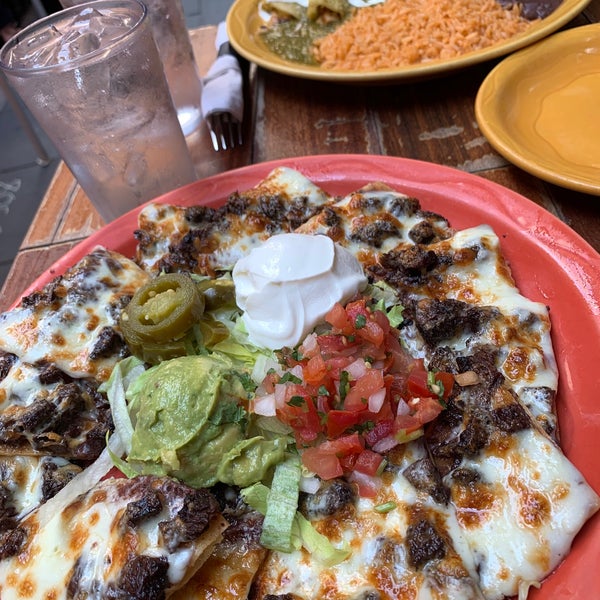 Photo taken at Mad Dog &amp; Beans Mexican Cantina by Elvan S. on 7/9/2022