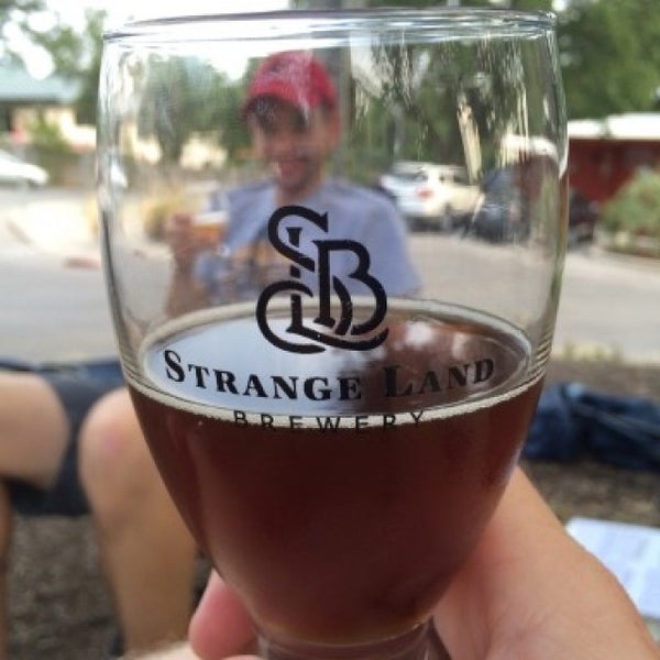 Photo taken at Strange Land Brewery by Ben T. on 8/29/2015