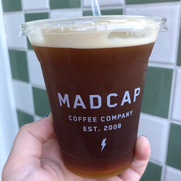 Photo taken at Madcap Coffee by Erica F. on 9/17/2018