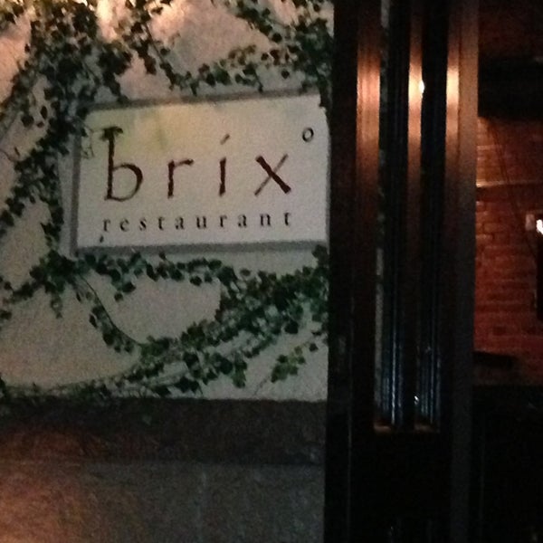 Photo taken at Brix &amp; Mortar by Mike B. on 4/9/2013