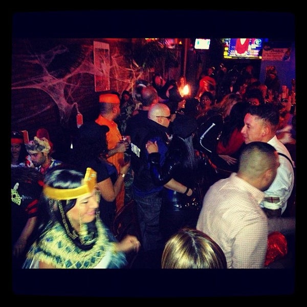 Photo taken at Tropix Bar &amp; Lounge by Alexander F. on 10/28/2012
