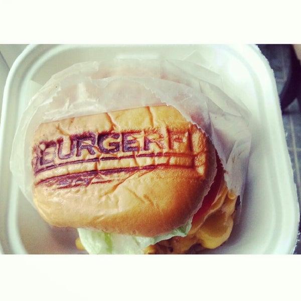 Photo taken at BurgerFi by Jenn M. on 1/7/2014