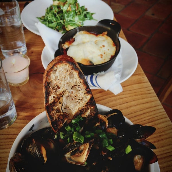 Make a full meal for 2 out of just appetizers:: Arugula salad with olives, fried artichokes and lemon. Wood fired mussels. And last but not least, the pork and beef meatballs in a spicy marinara