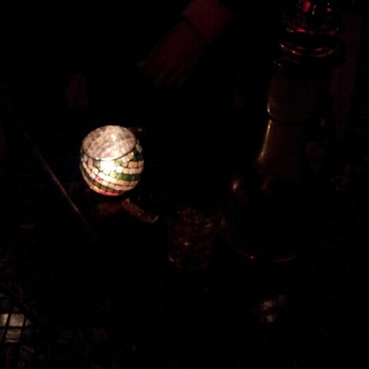 Photo taken at Sahra Hookah Lounge by Lucy W. on 11/20/2012