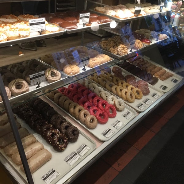 Photo taken at Guru Donuts by Caitlin . on 3/12/2018