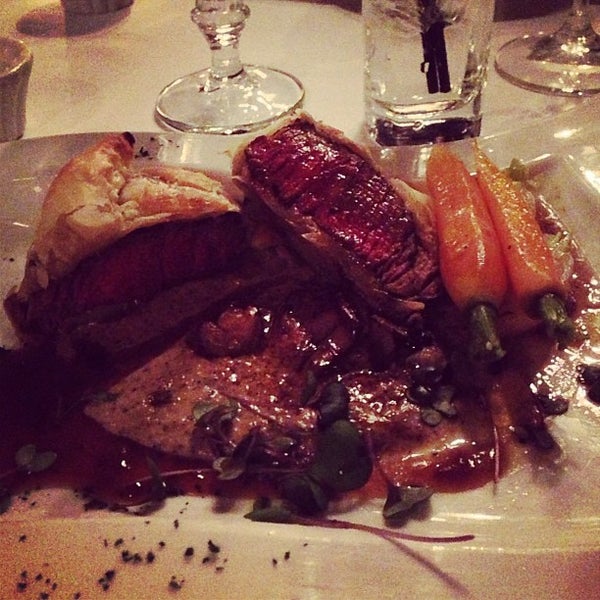 Photo taken at Chez Francois Restaurant &amp; Touche Bistro by Katrina E. on 12/28/2012