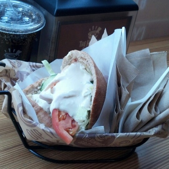 Photo taken at The Hummus &amp; Pita Co by Paul P. on 12/31/2013