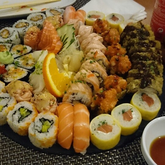 Photo taken at Twosushi by Patricia A. on 2/26/2014
