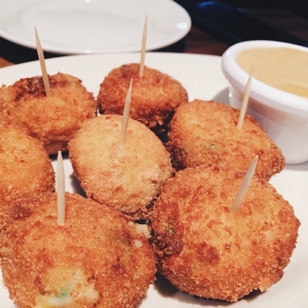 Munch on their potato bites house special - deep fried and filled with mashed potatoes, peas, and cheese!