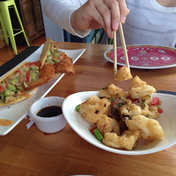 Photo taken at Foo Dog: Asian Street Food by Jason S. on 5/17/2014