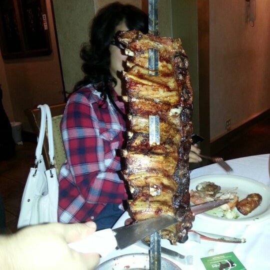 Photo taken at Angus Grill Brazilian Steakhouse by ᴡ D. on 9/30/2012