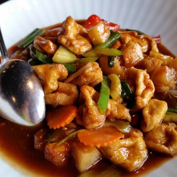 Photo taken at Thai Tanium Restaurant by David K. on 9/17/2014