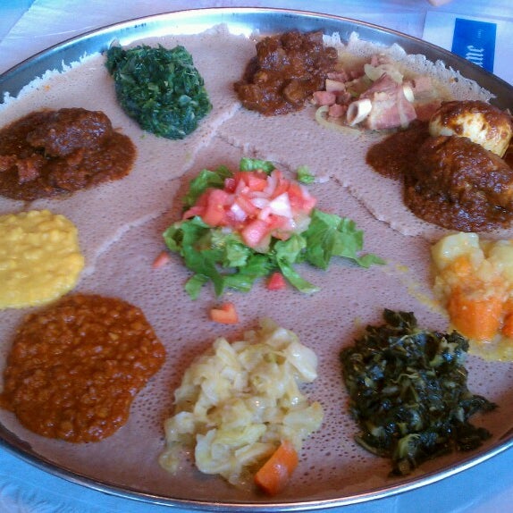 Photo taken at Ethiopian Diamond Restaurant &amp; Bar by Robin S. on 6/2/2013