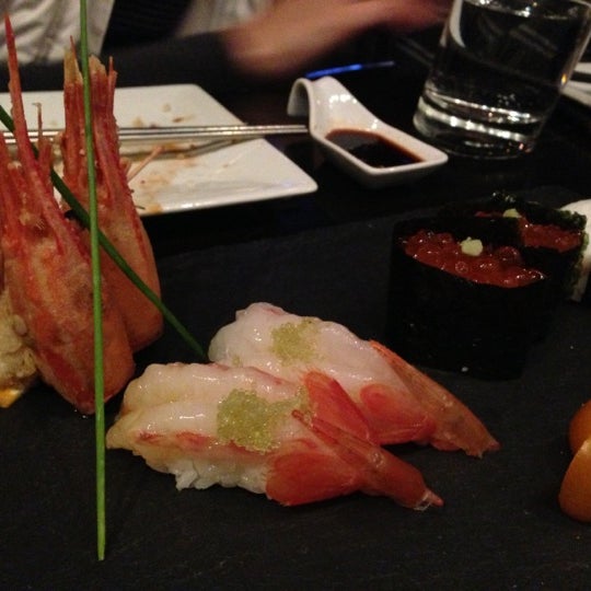 Photo taken at The One Sushi + by Christian O. on 12/8/2012