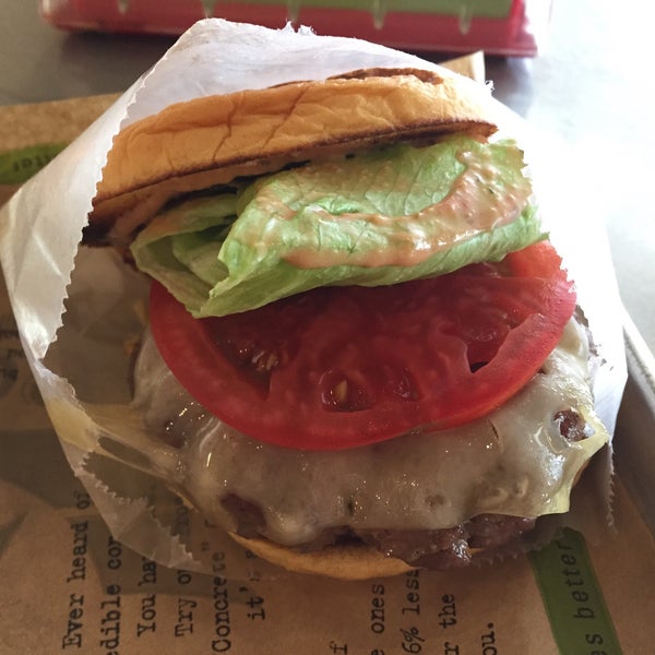 Photo taken at BurgerFi by Kirkwood J. on 5/8/2015