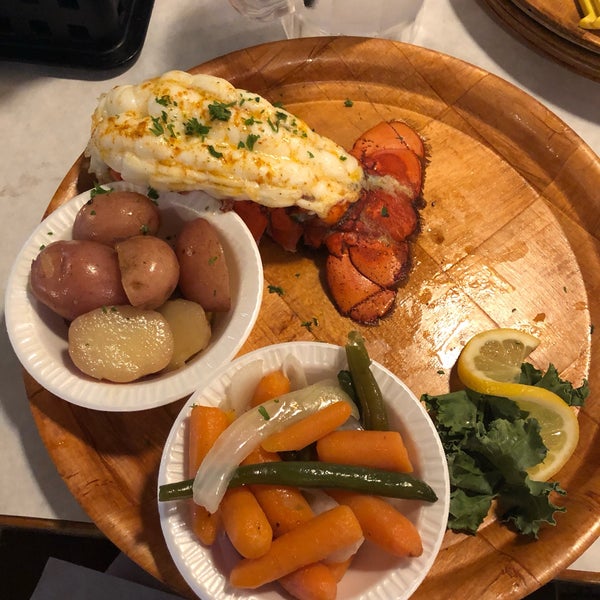 Photo taken at Rustic Inn Crabhouse by Anna on 6/23/2019