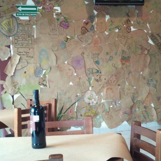 Photo taken at Italia al Forno (Pizzas a la Leña, Vinos, Bar) by Brenda H. on 12/2/2012