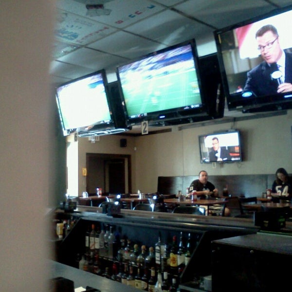 Photo taken at Grunions Sports Bar &amp; Grill by Charles W. on 9/8/2013