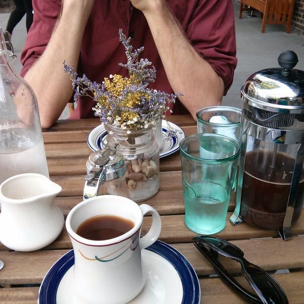 The French press coffee didn't look or taste like coffee at all but cute tables on the sidewalk and friendly staff.