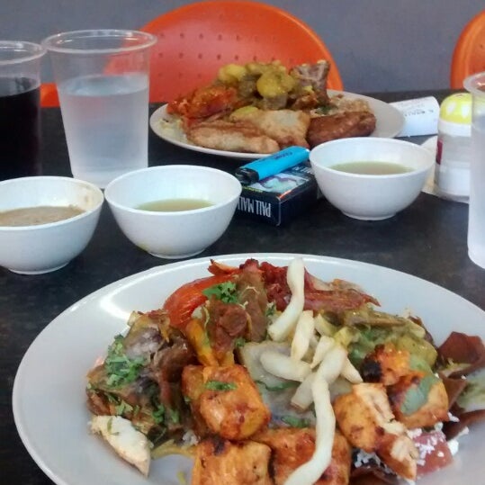 Photo taken at Al-Mukalla Arabian Restaurant by Abe V. on 7/19/2014