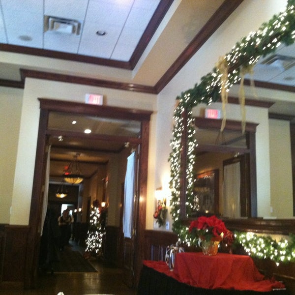 Photo taken at Maggiano&#39;s Little Italy by Jaecy H. on 12/20/2012