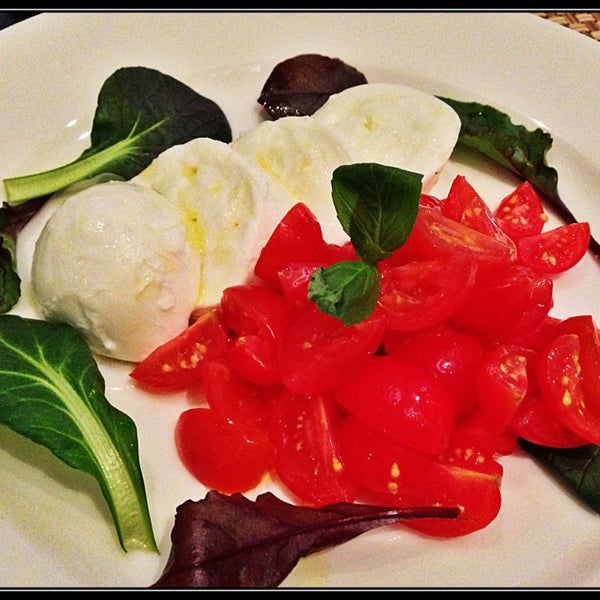 Photo taken at Cucina Mia Restaurant by Giorgio U. on 8/8/2013