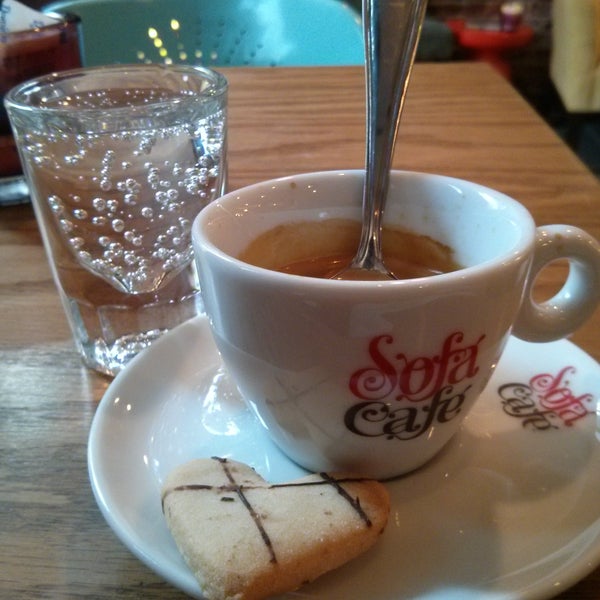 Their delicious espresso is served with sparkling water, and brought to your table! What else?