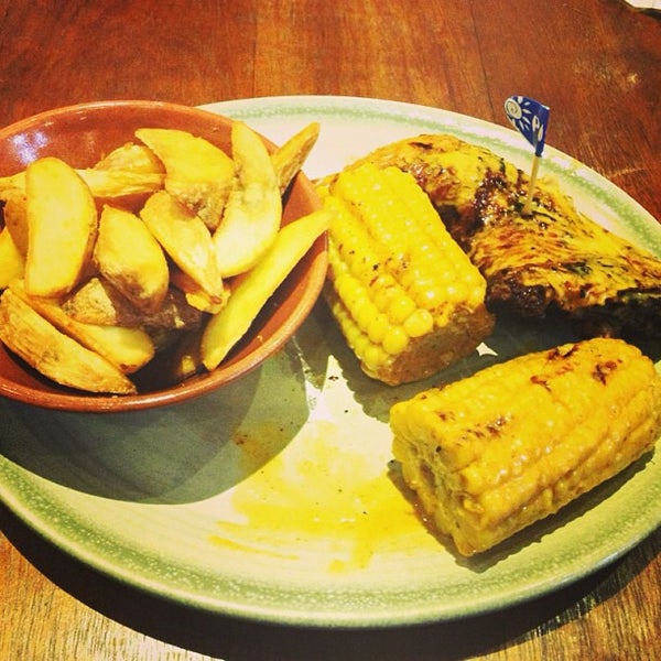 Photo taken at Nando&#39;s by Miss L. on 8/15/2013