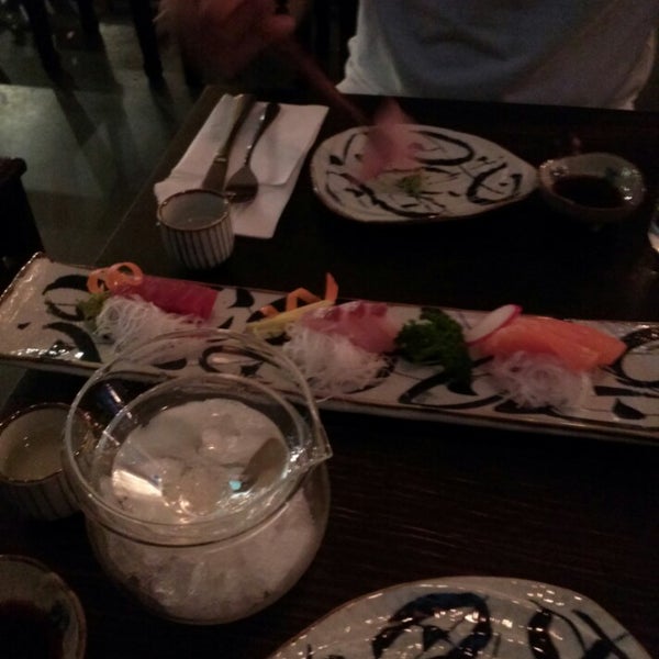 Photo taken at Yuzu Café &amp; Cuisine by April Y. on 1/9/2014