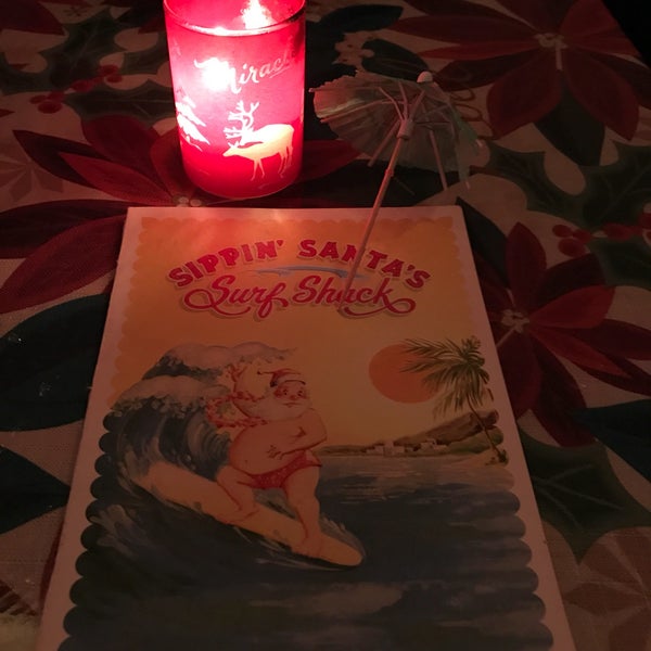 Photo taken at Sippin&#39; Santa&#39;s Surf Shack by Jason S. on 12/22/2016