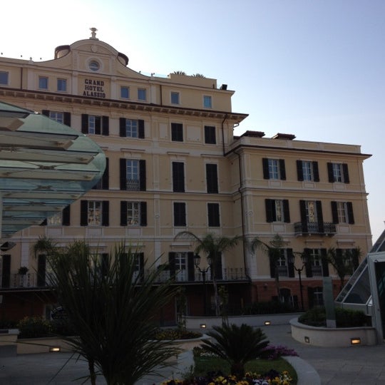 Photo taken at Grand Hotel Alassio by Michele B. on 4/1/2012