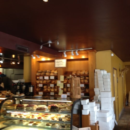 Photo taken at Wild Wheat Bakery Cafe &amp; Restaurant by Kris K. on 6/9/2012