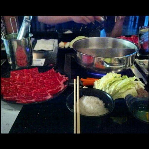 Photo taken at Yojie Japanese Fondue by Charles T. on 7/17/2012