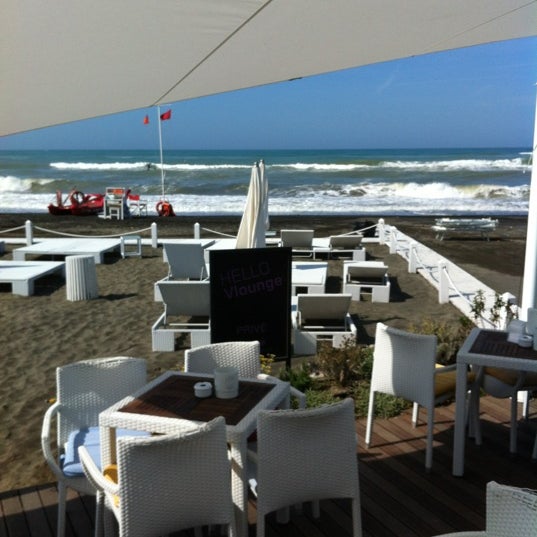 Photo taken at V Lounge Beach by lorenzo r. on 6/5/2012