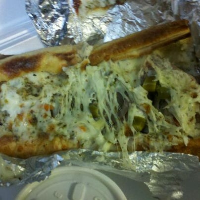 Photo taken at South of Chicago Pizza and Beef by Kelsey R. on 2/26/2012