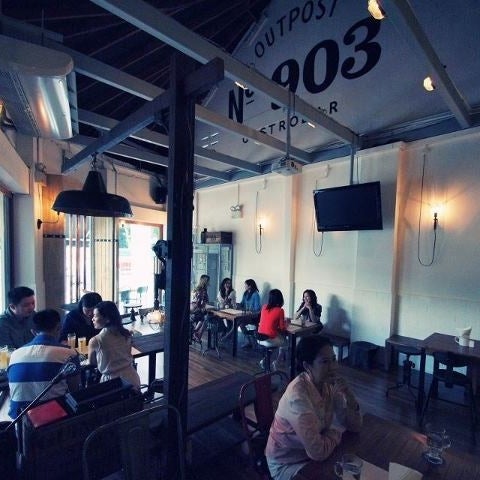 Photo taken at Outpost 903 Gastrobar by Ju H. on 4/24/2012