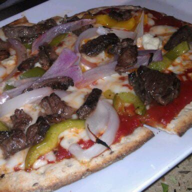 Photo taken at Pizza Fusion by Sandra D. on 4/3/2012