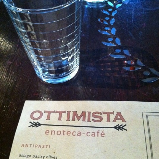 Photo taken at Ottimista Enoteca-Café by 🎀 Rachael 👑 D. on 5/10/2012