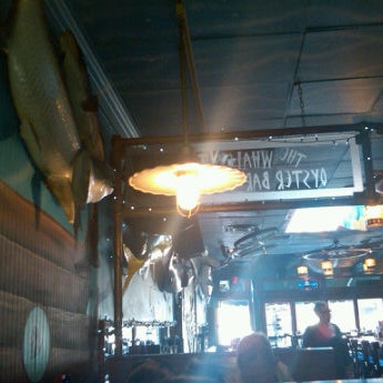 Photo taken at The Whale&#39;s Tale Oyster Bar, Chowder House &amp; Seafood Grill by Rachel C. on 10/22/2011